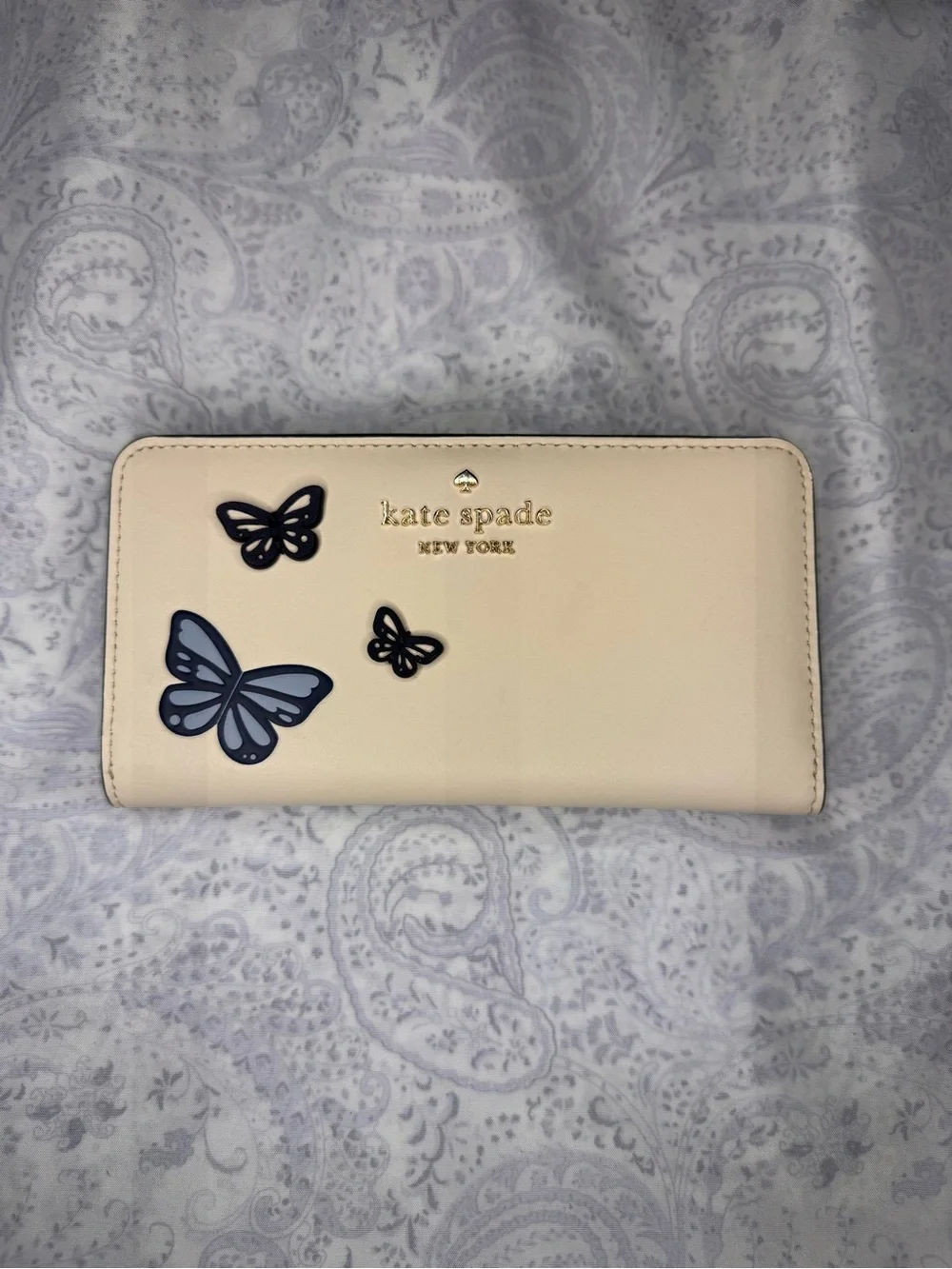 kate spade cream zip